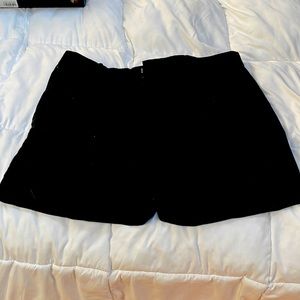 Black 3” inseam shorts, never worn.